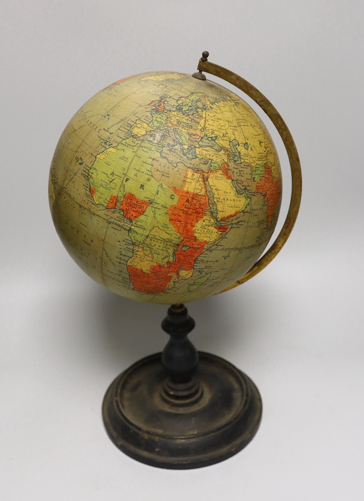 An Edwardian Philip’s 9 inch terrestrial globe, printed in Great Britain by George Philip and Son, 42cms high